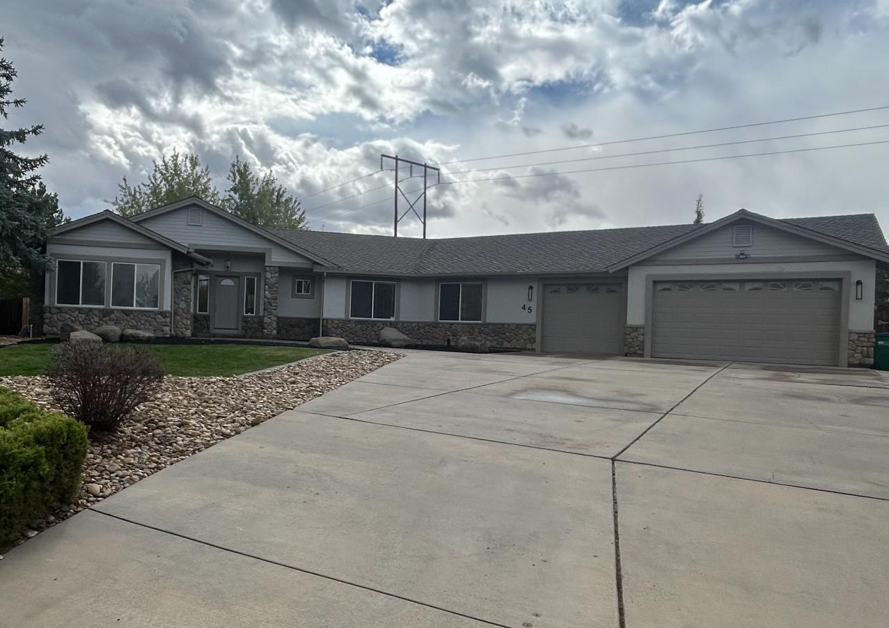 Completed home exterior and driveway