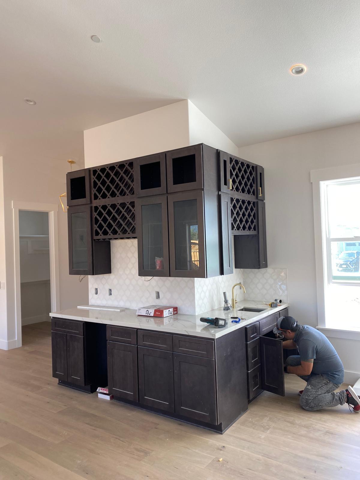 Kitchen cabinetry installation in progress