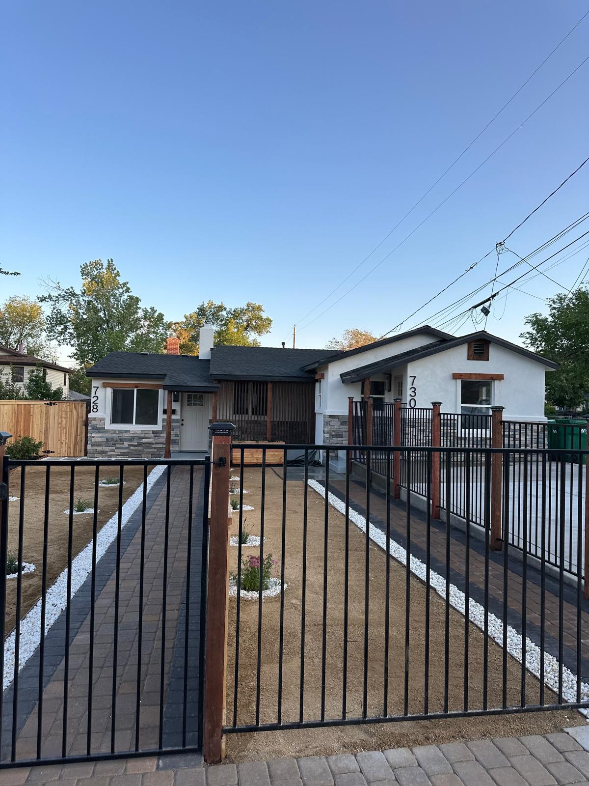Finished residential property with fencing and landscaping